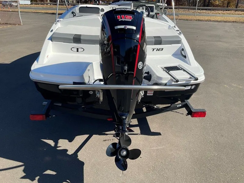 Slide: The Image of 2025 Tahoe T18 boat with Mercury 115 outboard motor, rear view. - 32