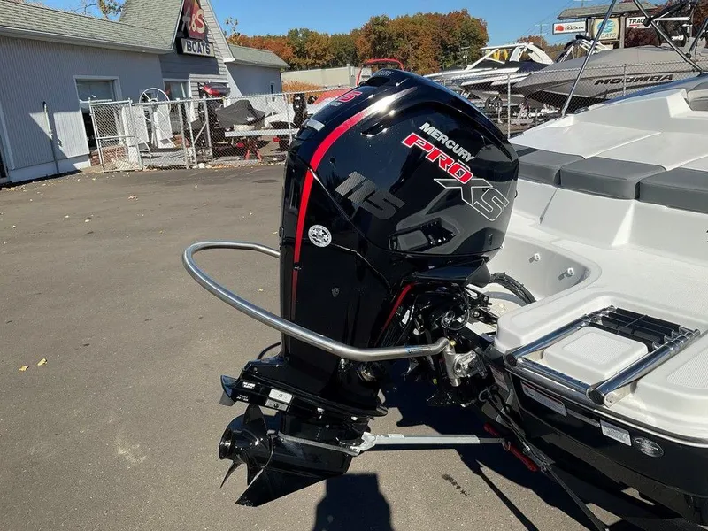 Slide: The Image of 2025 Tahoe T18 boat with Mercury Pro XS outboard motor in a boatyard. - 33