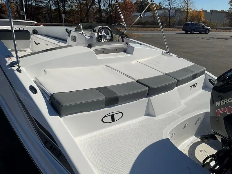 Slide: The Image of 2025 Tahoe T18 boat with sleek design and comfortable seating. - 9