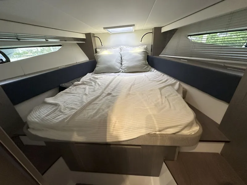 Slide: The Image of Luxurious cabin interior of 2025 Beneteau Gran Turismo 36 yacht with cozy bedding. - 19