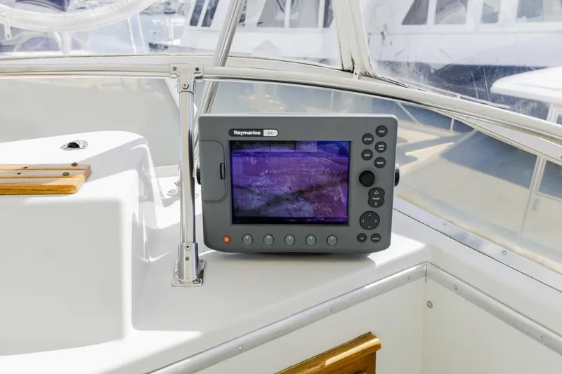 Slide: The Image of Raymarine navigation system on 1983 Uniflite 42 Aft Cabin yacht. - 22