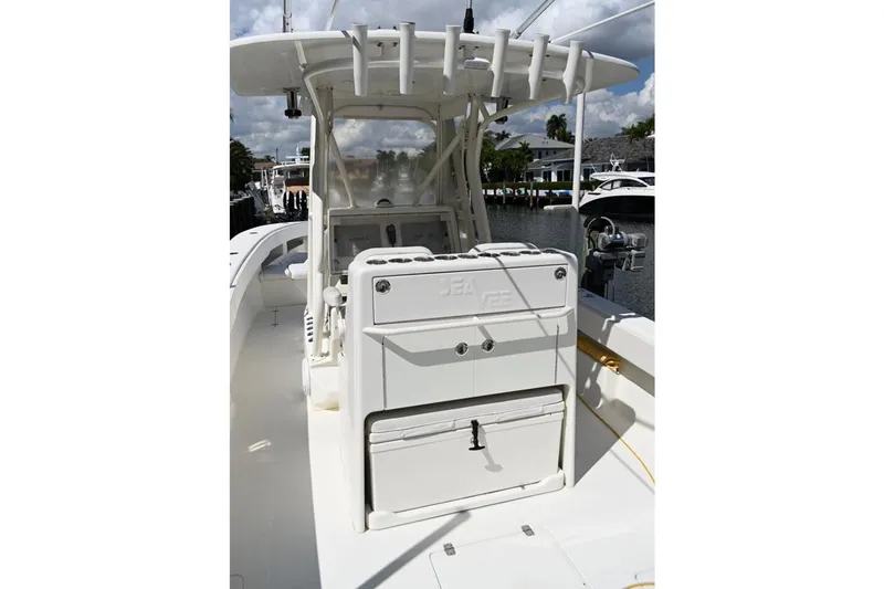 Slide: The Image of 2016 SeaVee 340Z boat interior with helm station and storage compartments. - 11