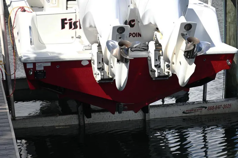 Slide: The Image of 2016 SeaVee 340Z boat with dual outboard motors, docked on a lift. - 4