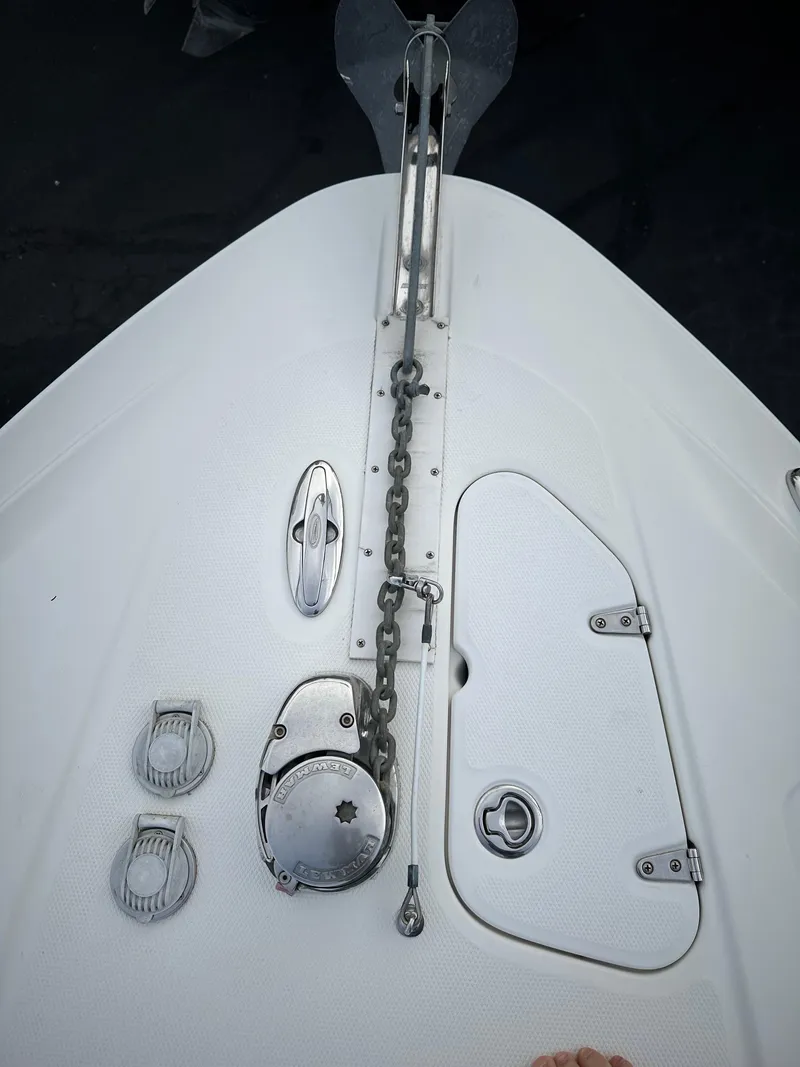 Slide: The Image of 2007 Chaparral Signature 270 boat deck with anchor chain and hatch. - 14