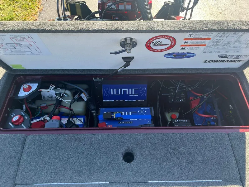 Slide: The Image of 2015 Ranger Z521 Comanche boat battery compartment with Ionic deep cycle batteries and wiring. - 25