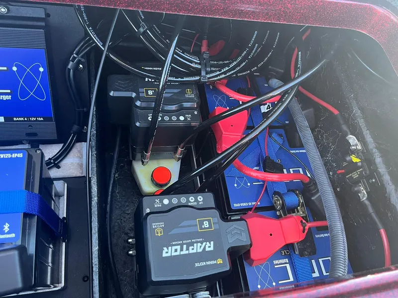 Slide: The Image of 2015 Ranger Z521 Comanche battery compartment with wiring and power units. - 31