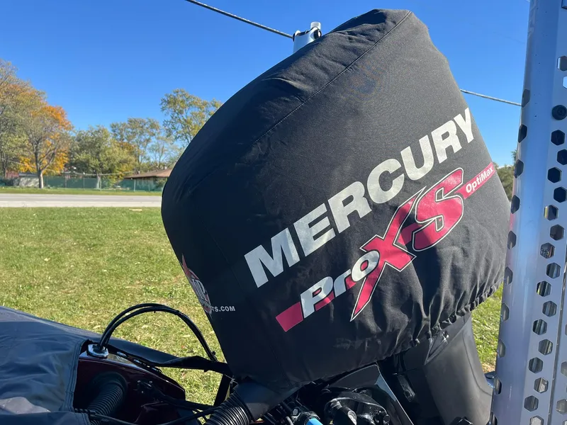 Slide: The Image of Mercury ProXS engine cover on 2015 Ranger Z521 Comanche boat, outdoors. - 34