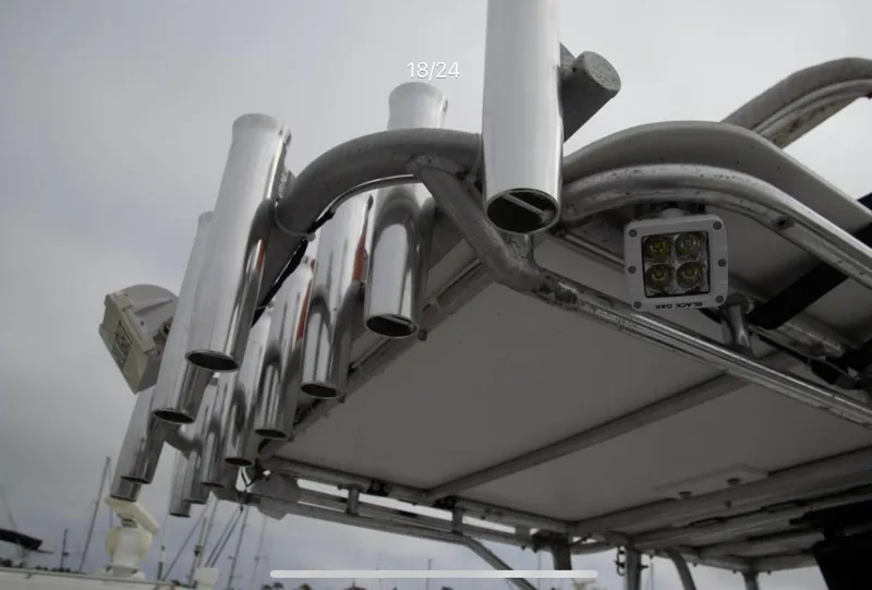 Slide: The Image of 1979 Chaparral 224 Fisherman boat with rod holders and mounted light. - 11