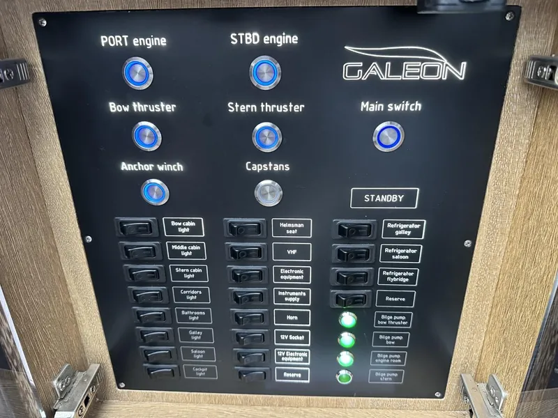 Slide: The Image of Control panel of 2019 Galeon 650 Sky yacht with engine and thruster switches. - 13