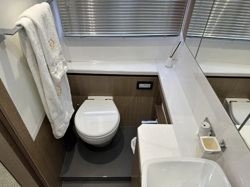 Slide: The Image of Luxurious bathroom in 2019 Galeon 650 Sky yacht with modern fixtures and elegant design. - 27