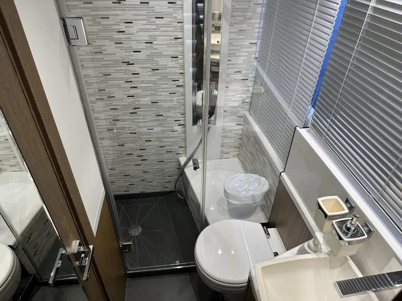 Slide: The Image of Luxurious bathroom in 2019 Galeon 650 Sky yacht with modern fixtures and sleek design. - 28