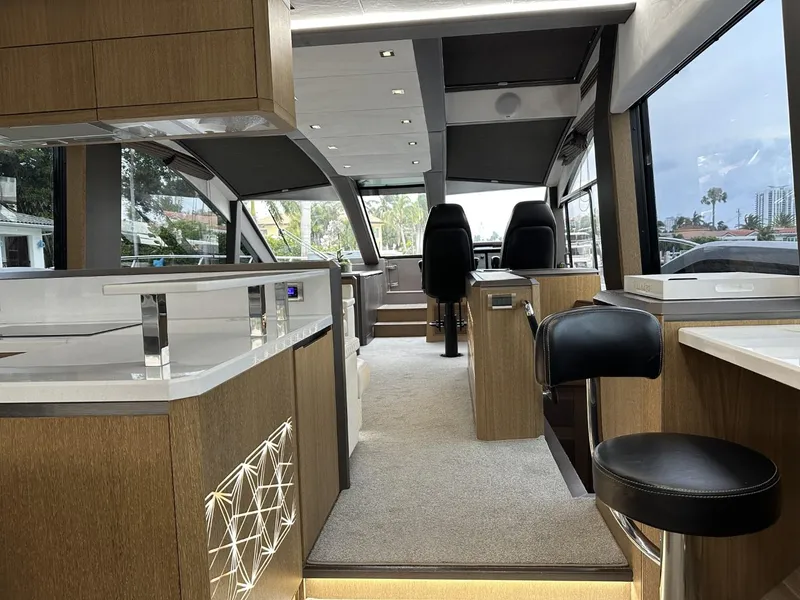Slide: The Image of Luxurious interior of 2019 Galeon 650 Sky yacht with modern design and panoramic windows. - 29