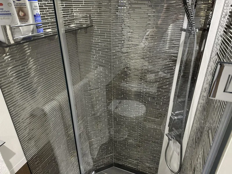 Slide: The Image of Modern shower with sleek tile design in 2019 Galeon 650 Sky yacht. - 36