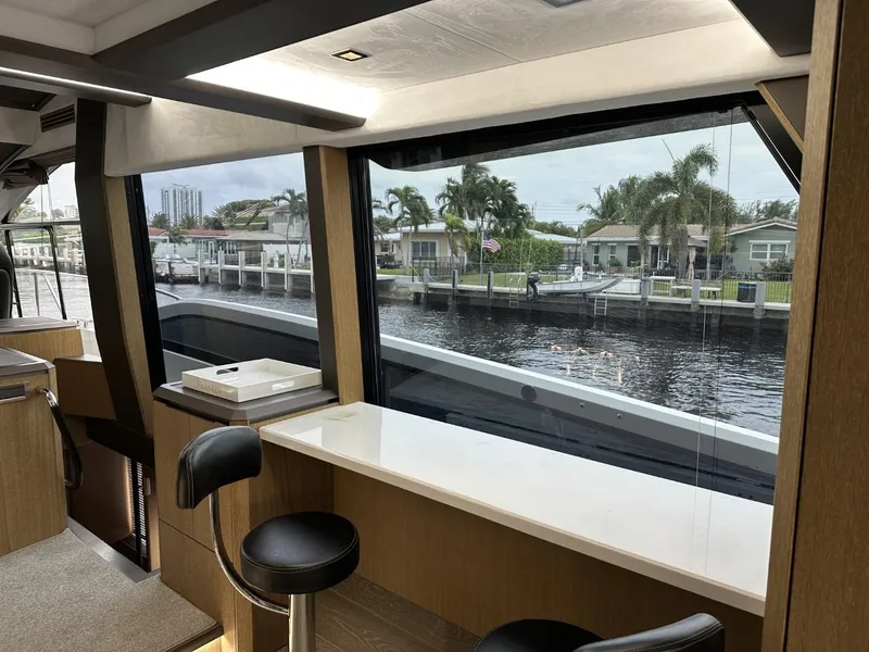 Slide: The Image of Luxurious interior of 2019 Galeon 650 Sky yacht with waterfront view. - 37