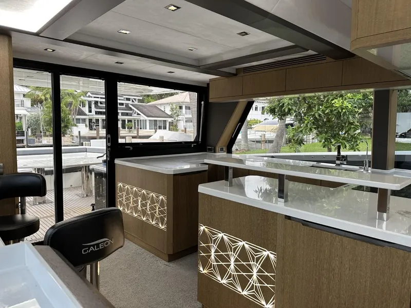 Slide: The Image of Luxurious interior of 2019 Galeon 650 Sky yacht with modern kitchen design. - 40