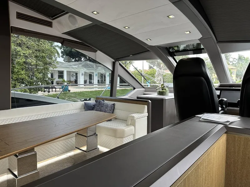 Slide: The Image of Luxurious interior of 2019 Galeon 650 Sky yacht with modern seating and large windows. - 45