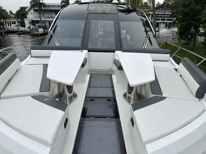 Slide: The Image of 2019 Galeon 650 Sky yacht with sleek deck design and modern seating arrangement. - 46