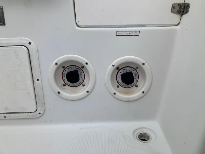 Slide: The Image of Close-up of 2005 Sailfish 266 CC boat controls and fittings. - 24