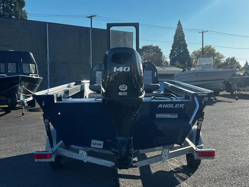 Slide: The Image of 2024 Fish Rite Angler 18 boat with 140 HP engine on trailer. - 6