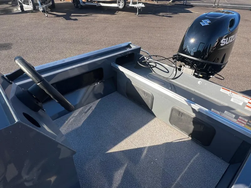 Slide: The Image of 2024 Fish Rite Angler 18 boat interior with Suzuki outboard motor. - 7