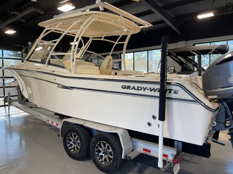 Slide: The Image of 2016 Grady-White 275 Freedom boat on trailer in showroom. - 0