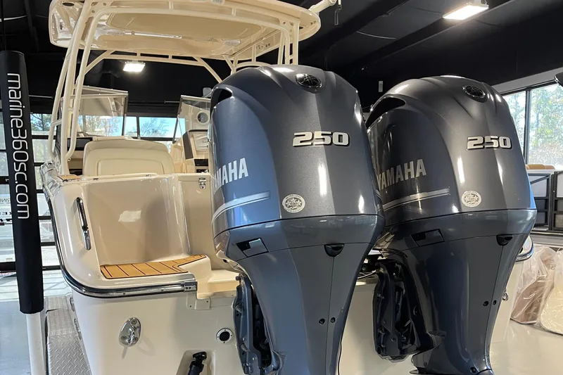 Slide: The Image of 2016 Grady-White 275 Freedom boat with twin Yamaha 250 engines in showroom. - 1
