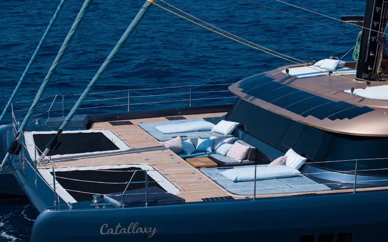 Slide: The Image of Luxurious 2024 Sunreef 60 Sail yacht with spacious deck and comfortable lounging area. - 18