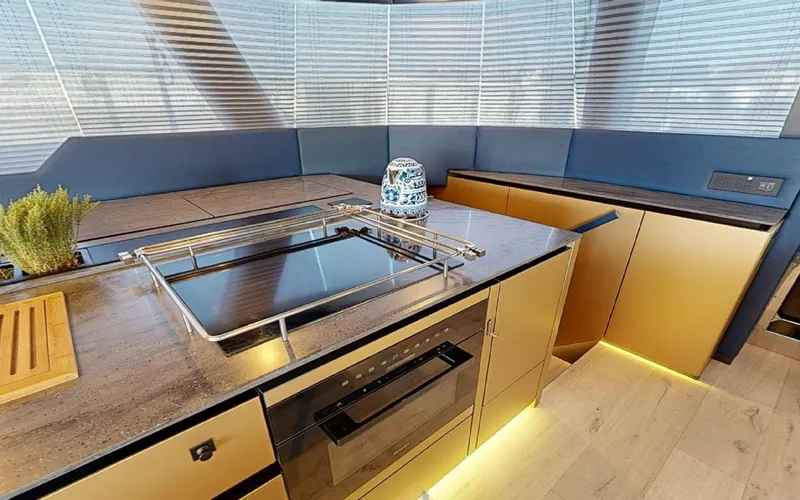 Slide: The Image of Modern kitchen interior on 2024 Sunreef 60 Sail yacht with sleek countertops and appliances. - 4