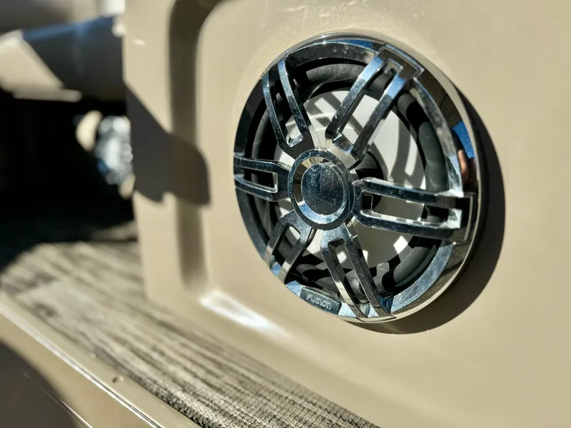 Slide: The Image of Close-up of a 2022 Tahoe Pontoon Cascade Platinum speaker detail. - 26