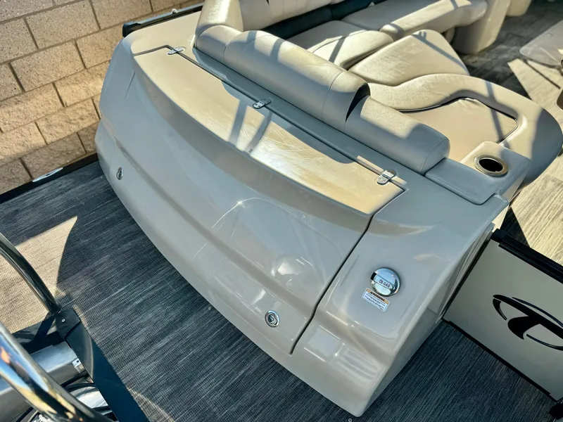 Slide: The Image of 2022 Tahoe Pontoon Cascade Platinum Rear J Lounger, beige seating, luxury boat interior. - 29