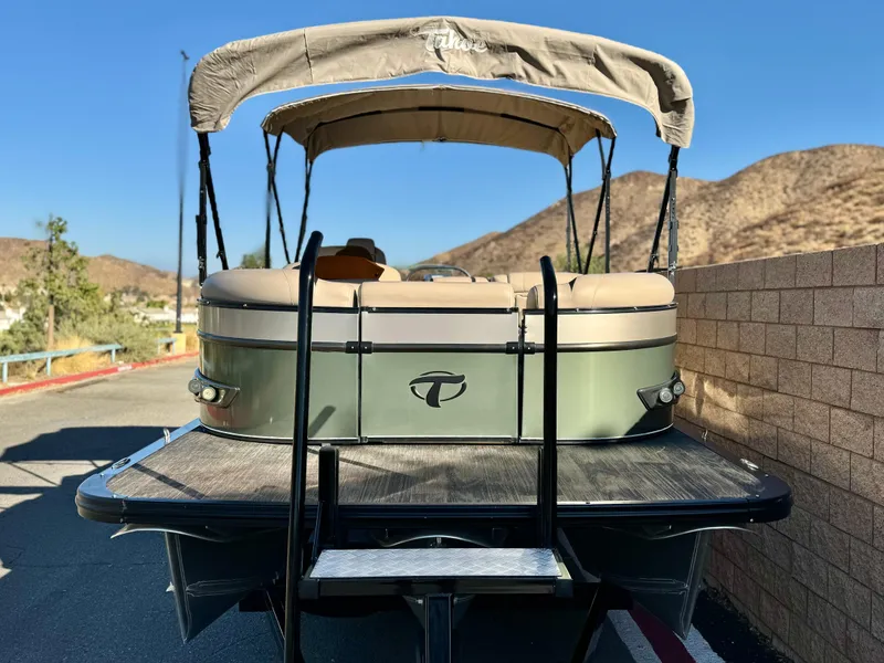 Slide: The Image of 2022 Tahoe Pontoon Cascade Platinum Rear J Lounger on a sunny day. - 3