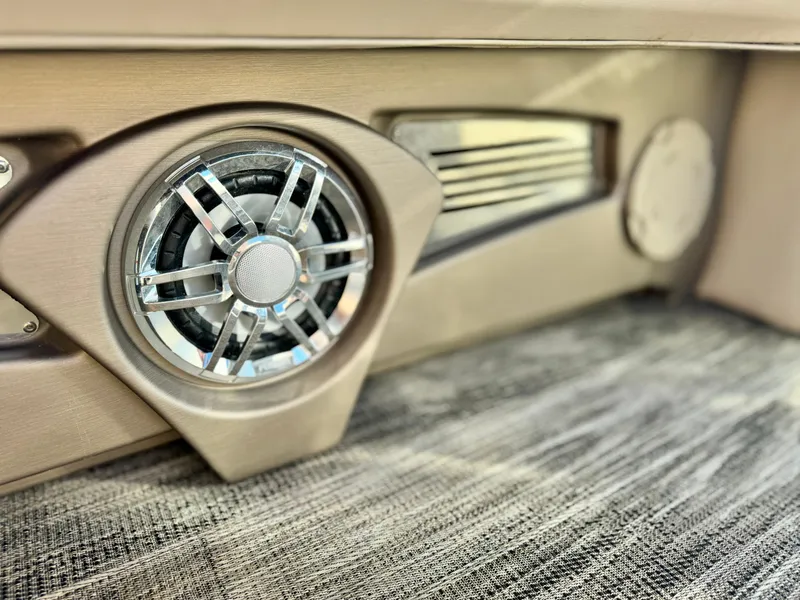 Slide: The Image of 2022 Tahoe Pontoon Cascade Platinum speaker detail on textured flooring. - 30