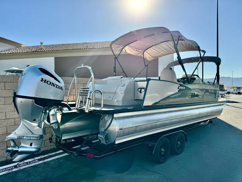 Slide: The Image of 2022 Tahoe Pontoon Cascade Platinum Rear J Lounger with Honda outboard motor. - 7