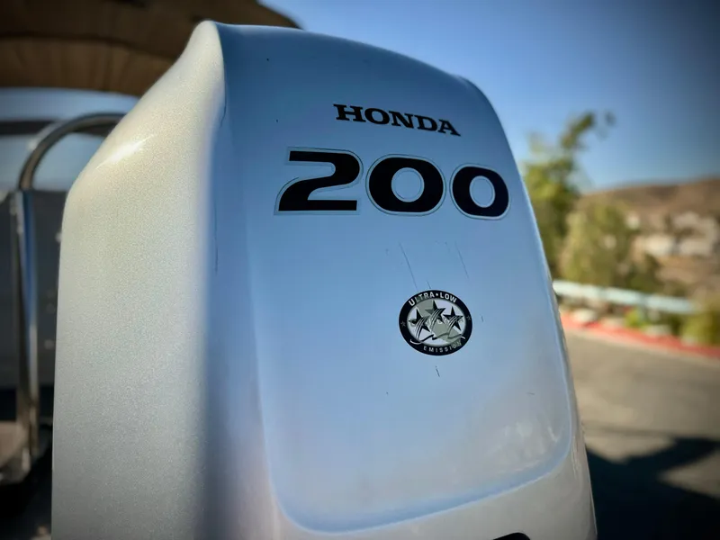 Slide: The Image of Honda 200 outboard motor on 2022 Tahoe Pontoon Cascade Platinum Rear J Lounger. - 8