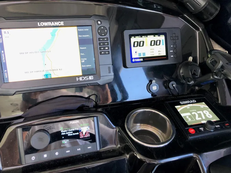 Slide: The Image of Jeanneau NC 895 2018 dashboard with navigation and control displays. - 37
