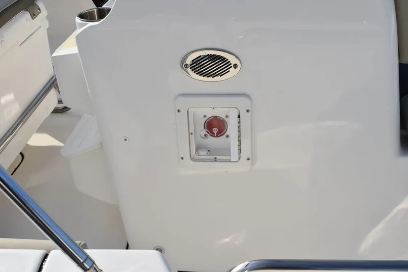 Slide: The Image of 2025 Key West 189 FS boat control panel with speaker and switch. - 13