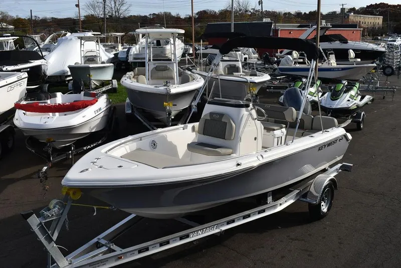 Slide: The Image of 2025 Key West 189 FS boat on trailer in dealership lot. - 2