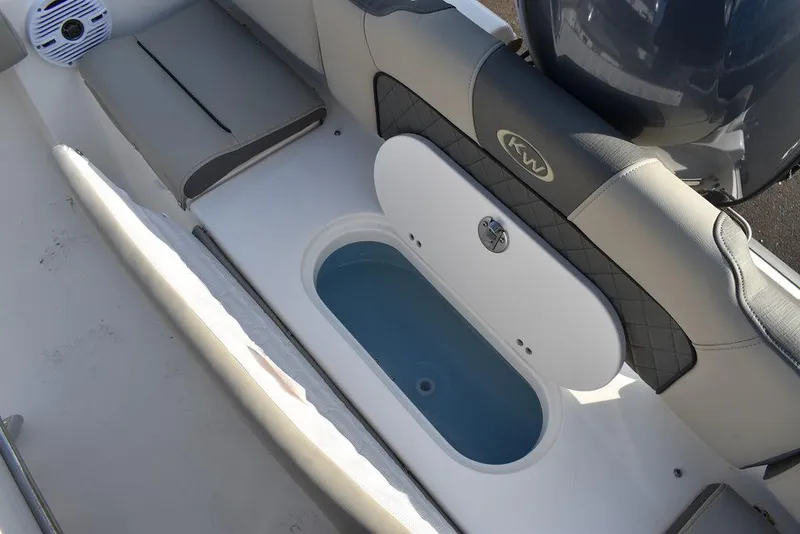Slide: The Image of 2025 Key West 189 FS boat interior with seating and storage compartment. - 22