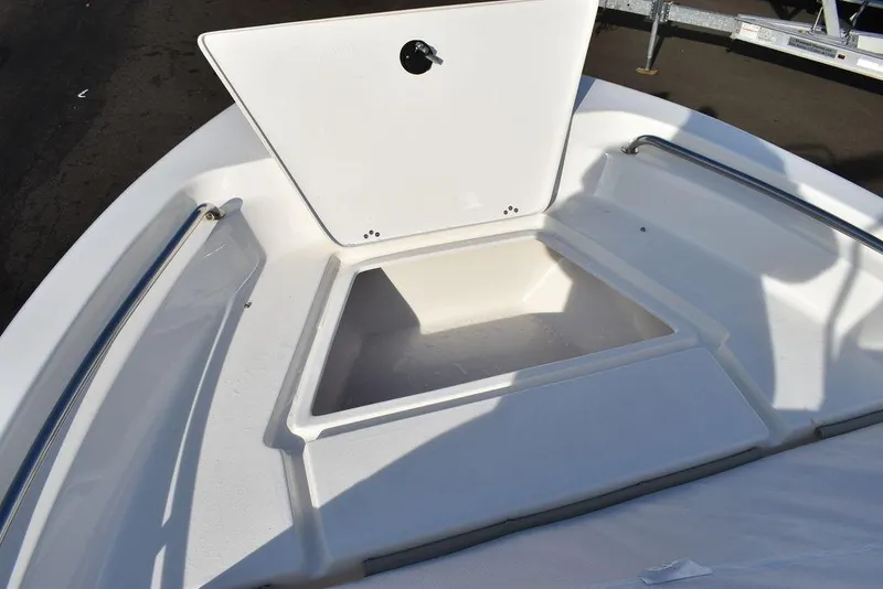 Slide: The Image of 2025 Key West 189 FS boat with open storage compartment on deck. - 28