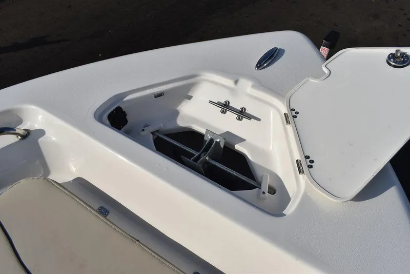 Slide: The Image of 2025 Key West 189 FS boat anchor storage compartment with open hatch. - 29