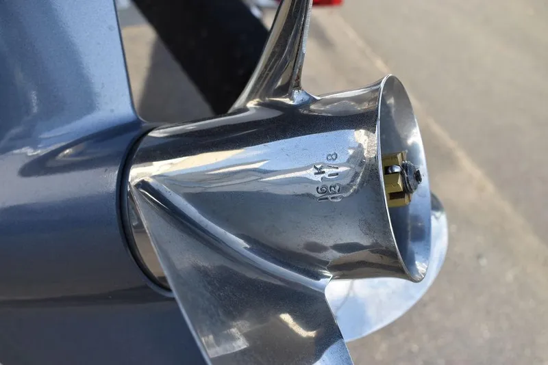 Slide: The Image of Close-up of a shiny boat propeller on a 2025 Key West 189 FS. - 35