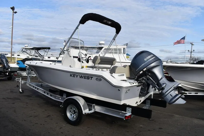 Slide: The Image of 2025 Key West 189 FS boat on trailer with Yamaha outboard motor. - 4