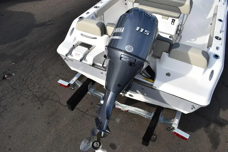 Slide: The Image of 2025 Key West 189 FS boat with Yamaha 115 outboard motor, rear view. - 7