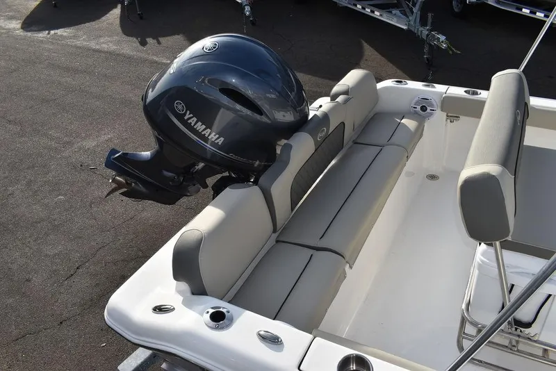 Slide: The Image of 2025 Key West 189 FS boat with Yamaha outboard motor, featuring comfortable seating. - 9