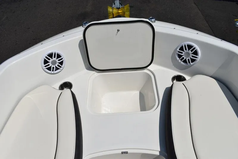 Slide: The Image of 2023 Stingray 191DC boat interior with storage compartment and speakers. - 41