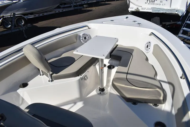 Slide: The Image of 2025 Key West 203 FS boat interior with seating and table. - 12