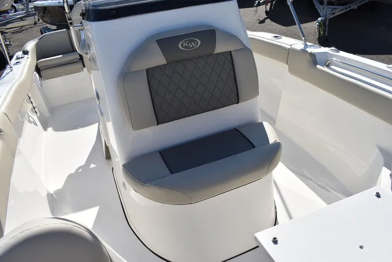 Slide: The Image of 2025 Key West 203 FS boat interior with cushioned seating. - 15