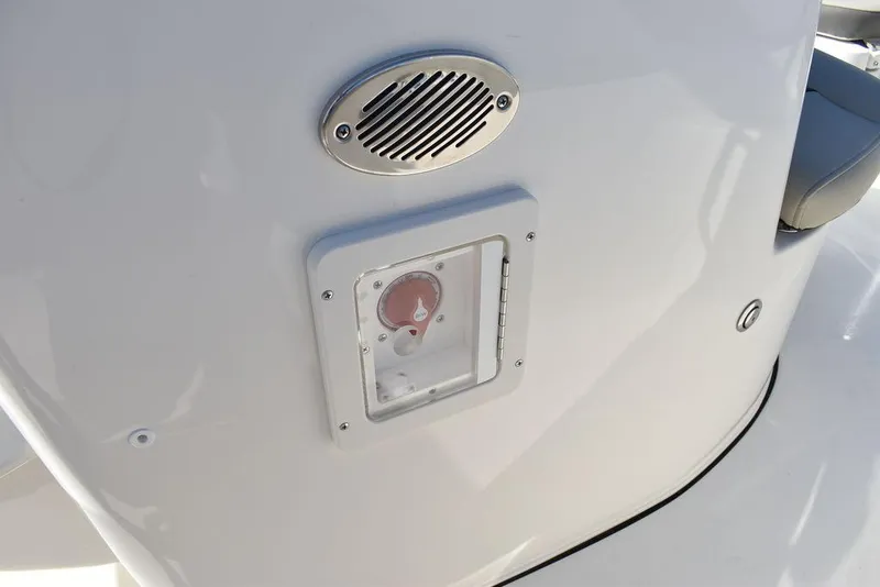 Slide: The Image of 2025 Key West 203 FS boat console with speaker and gauge. - 17