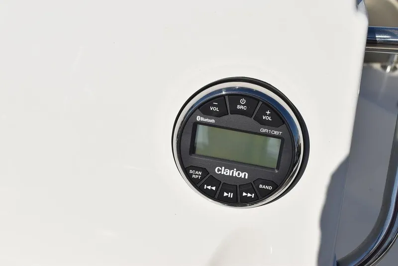 Slide: The Image of Clarion audio system on 2025 Key West 203 FS boat dashboard. - 22