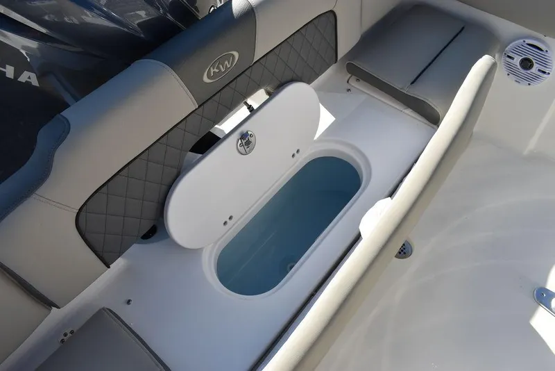 Slide: The Image of 2025 Key West 203 FS boat interior with open storage compartment. - 32